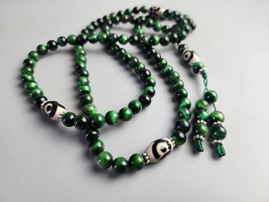 Green malachite prayer beads mala with white and black accent beads