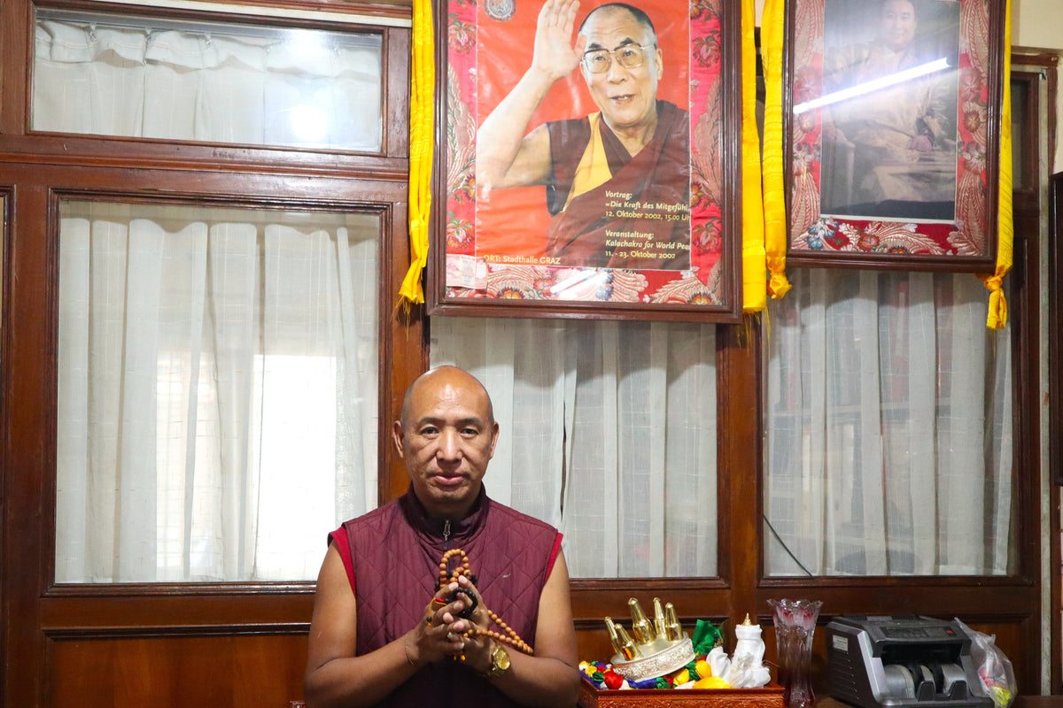 make a collection image of buddhist monk holding japa mala buddhachitta