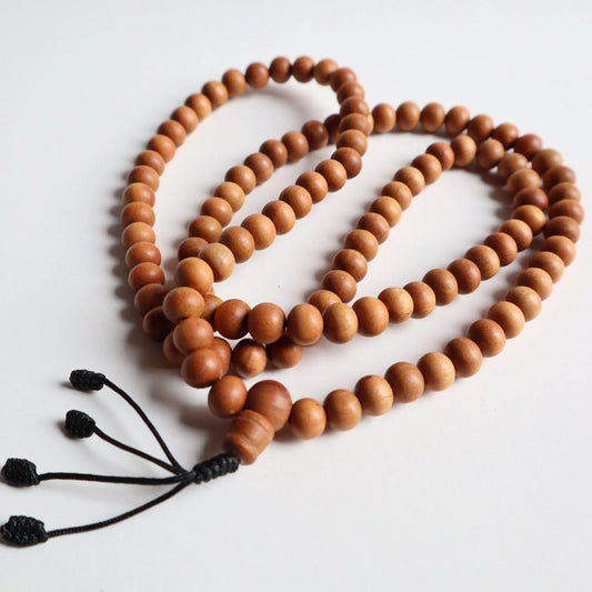 Traditional brown Bodhi seed mala prayer beads with black tassel
