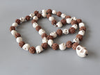 Om Kali Shiva Mala: Rudraksha, Howlite & Skull Prayer Beads