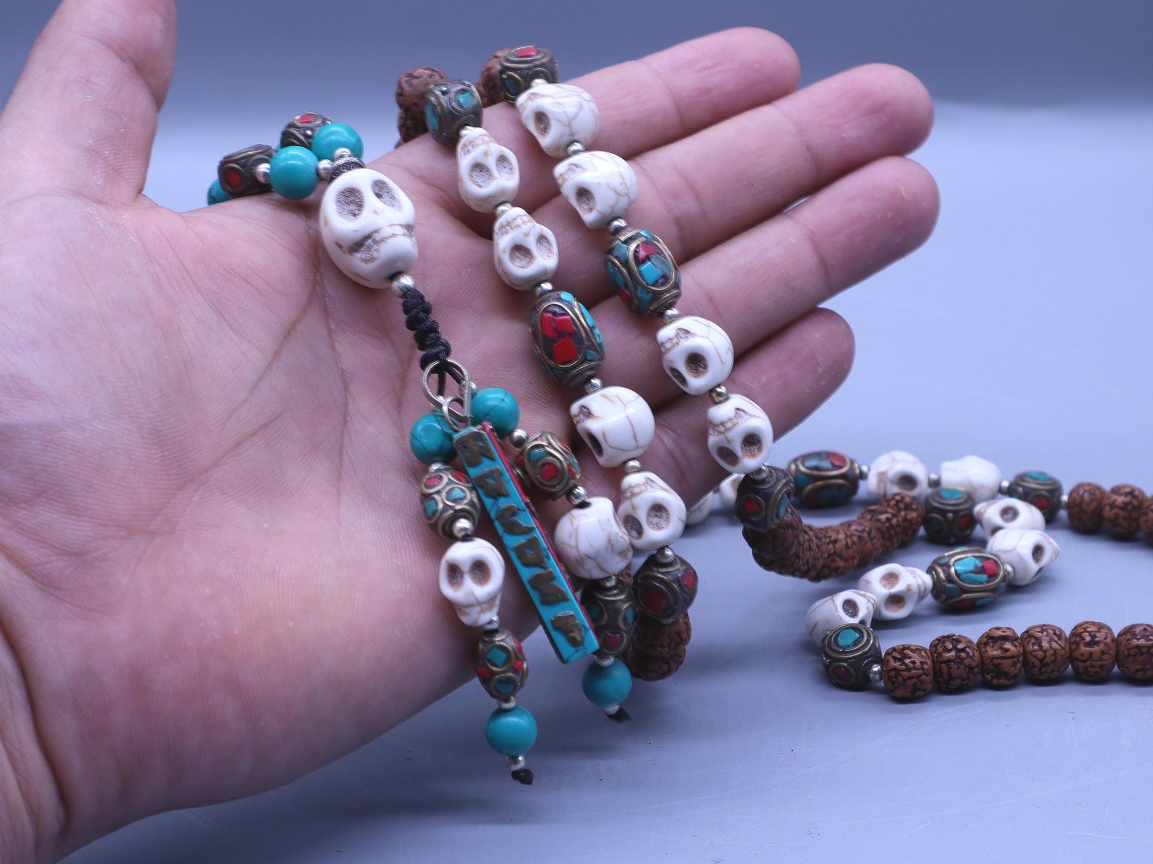 Tibetan Rudraksha Seed Mala: Howlite Skull Beads, Om Mani Padme Hum Tassel