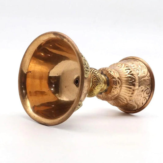 Handcrafted ornate copper ritual vessel with detailed engravings