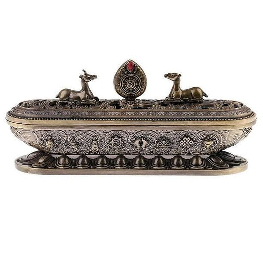 Ornate silver Tibetan incense burner with deer figures and traditional carvings