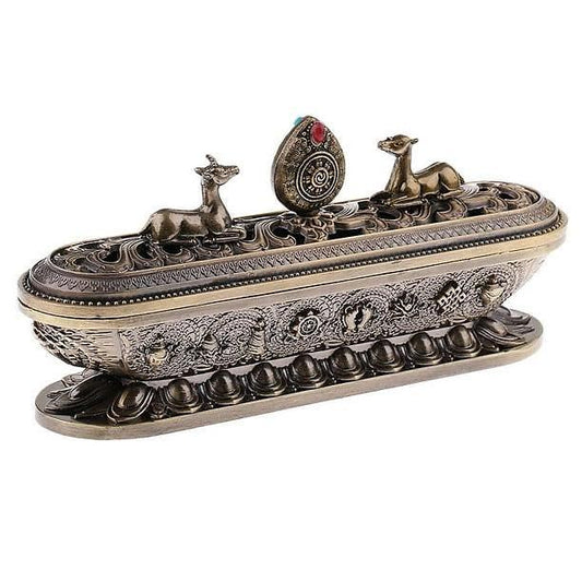 Ornate bronze-finished decorative metal jewelry box with deer figurines and a central gem