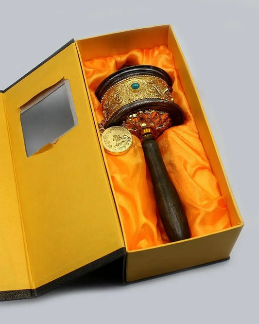 Ornate Tibetan ritual phurba dagger in a yellow silk-lined gift box