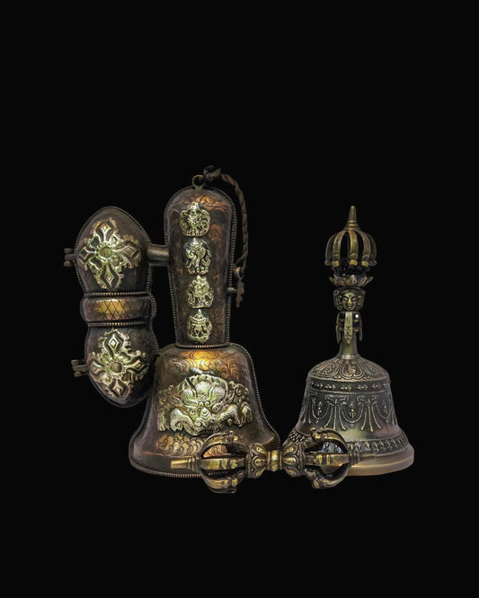 Ornate bronze Tibetan ritual bell and vajra spiritual tools from Nepal